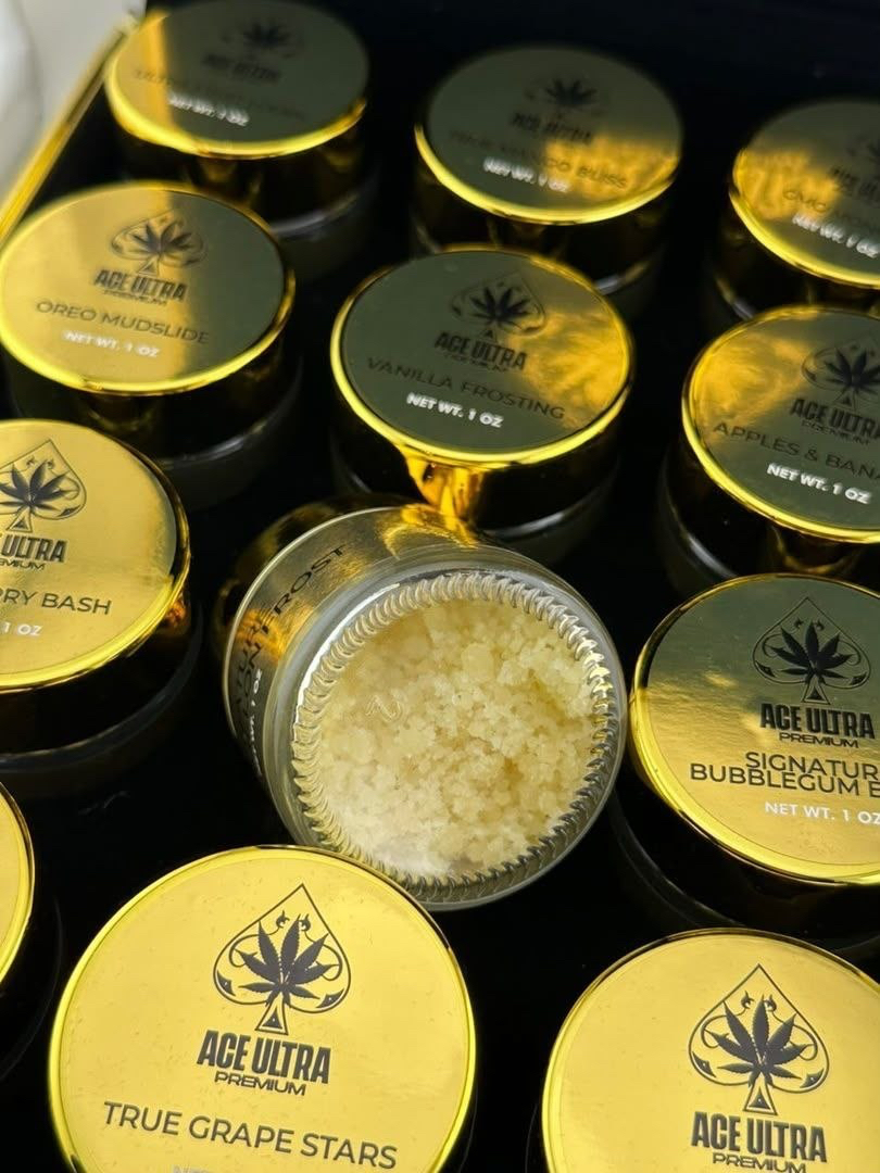 Ace Ultra Crumble 1oz concentrate box packaging and clear storage jar displaying golden wax 28g