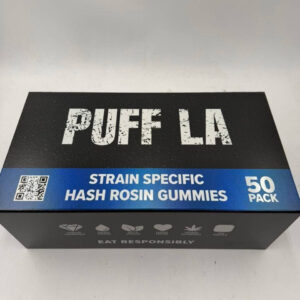 Puff LA Edibles 1000mg THC Cluster Gummies packaging display showing Strawberry Blueberry and Grape flavors